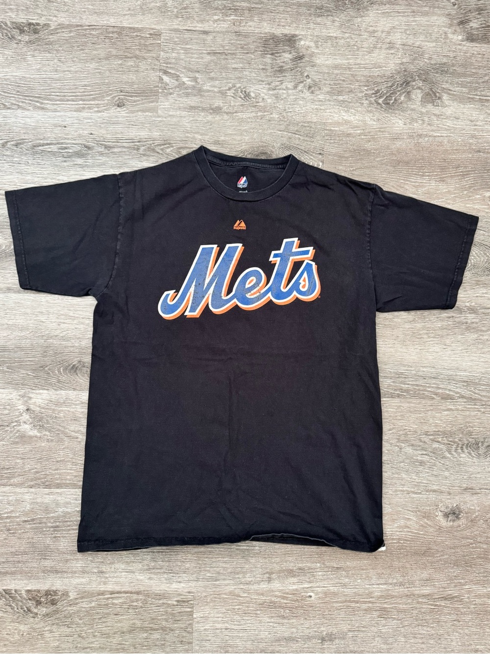 Majestic Black Tee with Red, White and Blue Logo